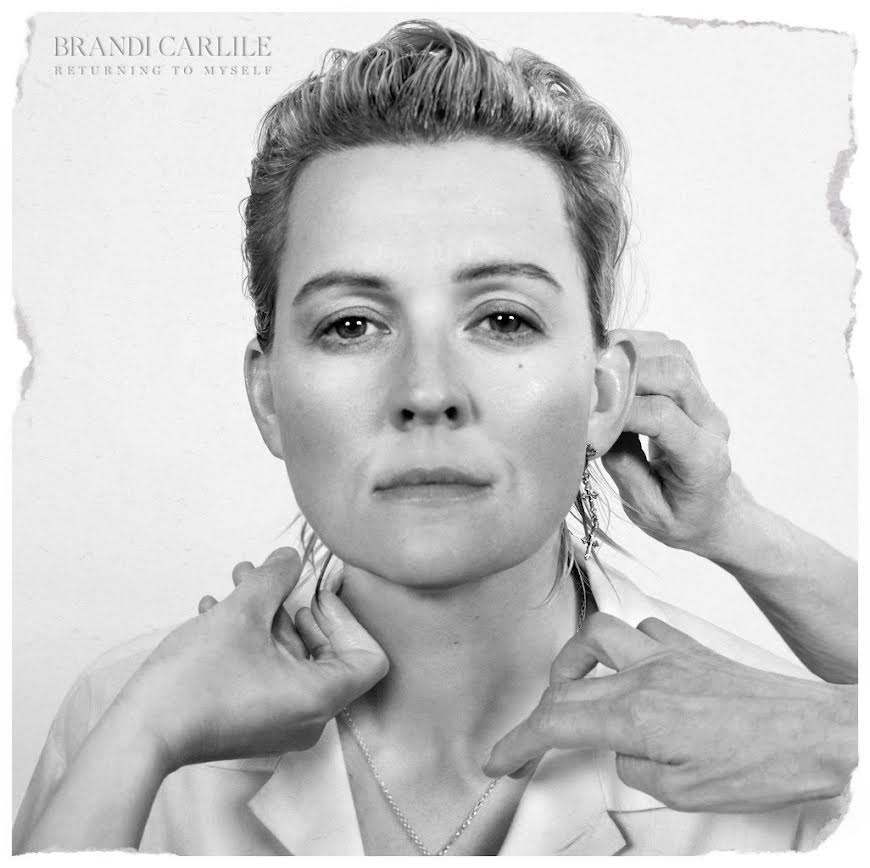 Brandi Carlile - Returning To Myself Album cover with a black and white portrait of a person adjusting an earring, with 'Brandi Carlile Returning to Myself' text.