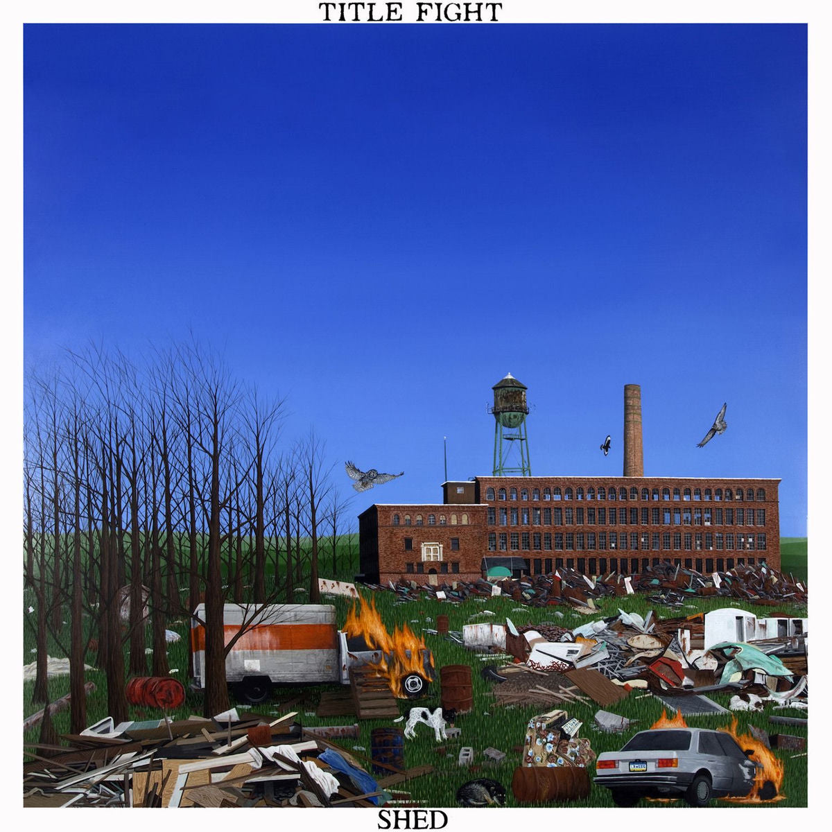 Title Fight - Shed Vinyl Album cover with a cityscape, buildings, and vehicles under a clear blue sky, featuring the text 'Title Fight' and 'Shed'.