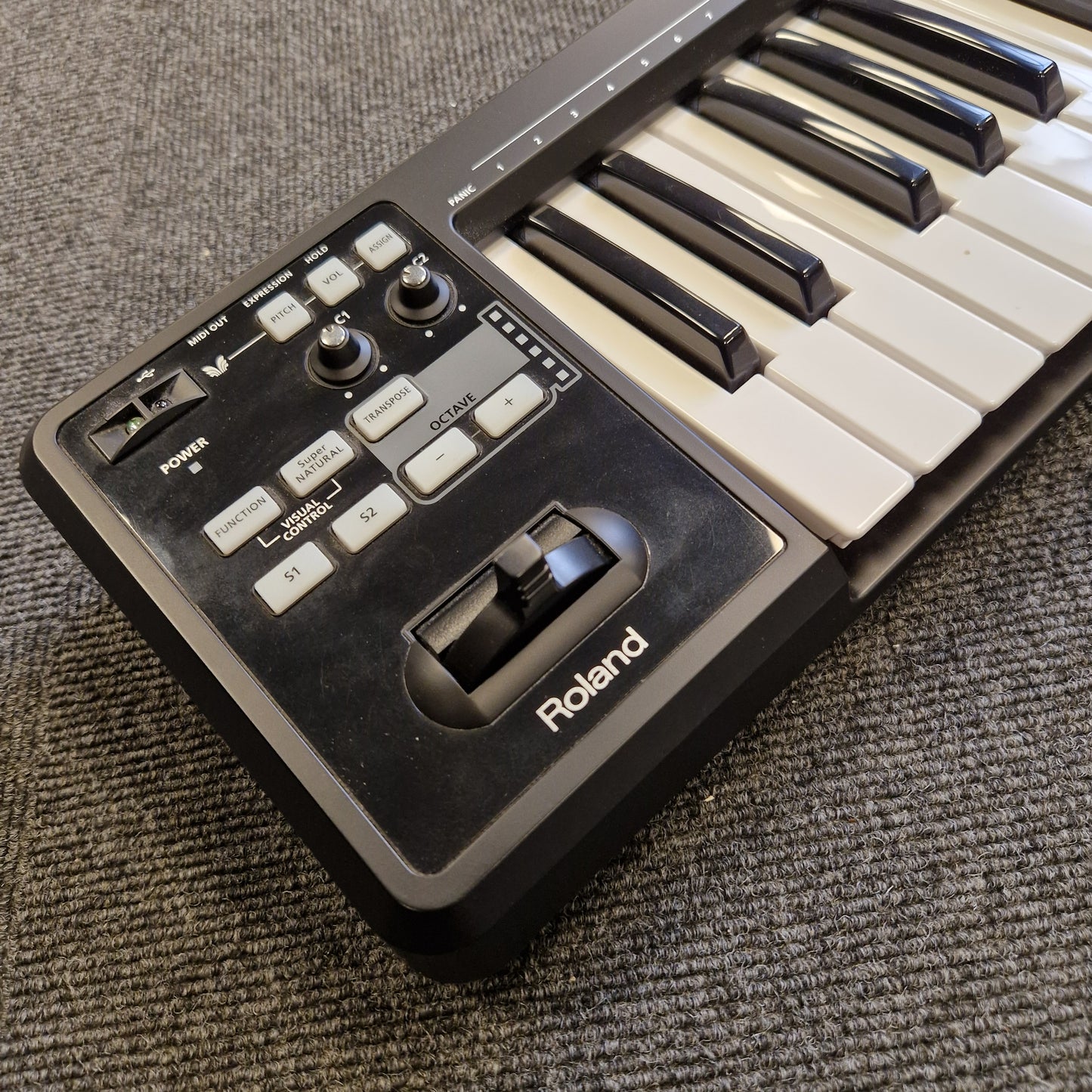 Roland A-49 MIDI Keyboard Roland keyboard controller on a textured surface