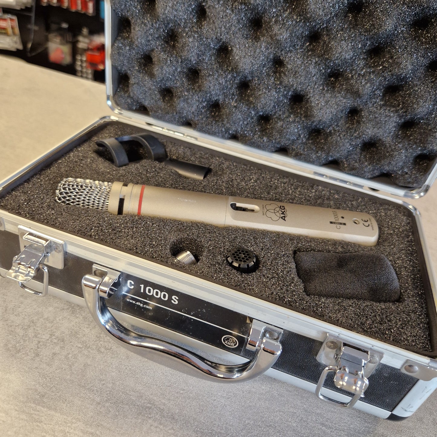 AKG C1000S Microphone in a protective case with foam lining