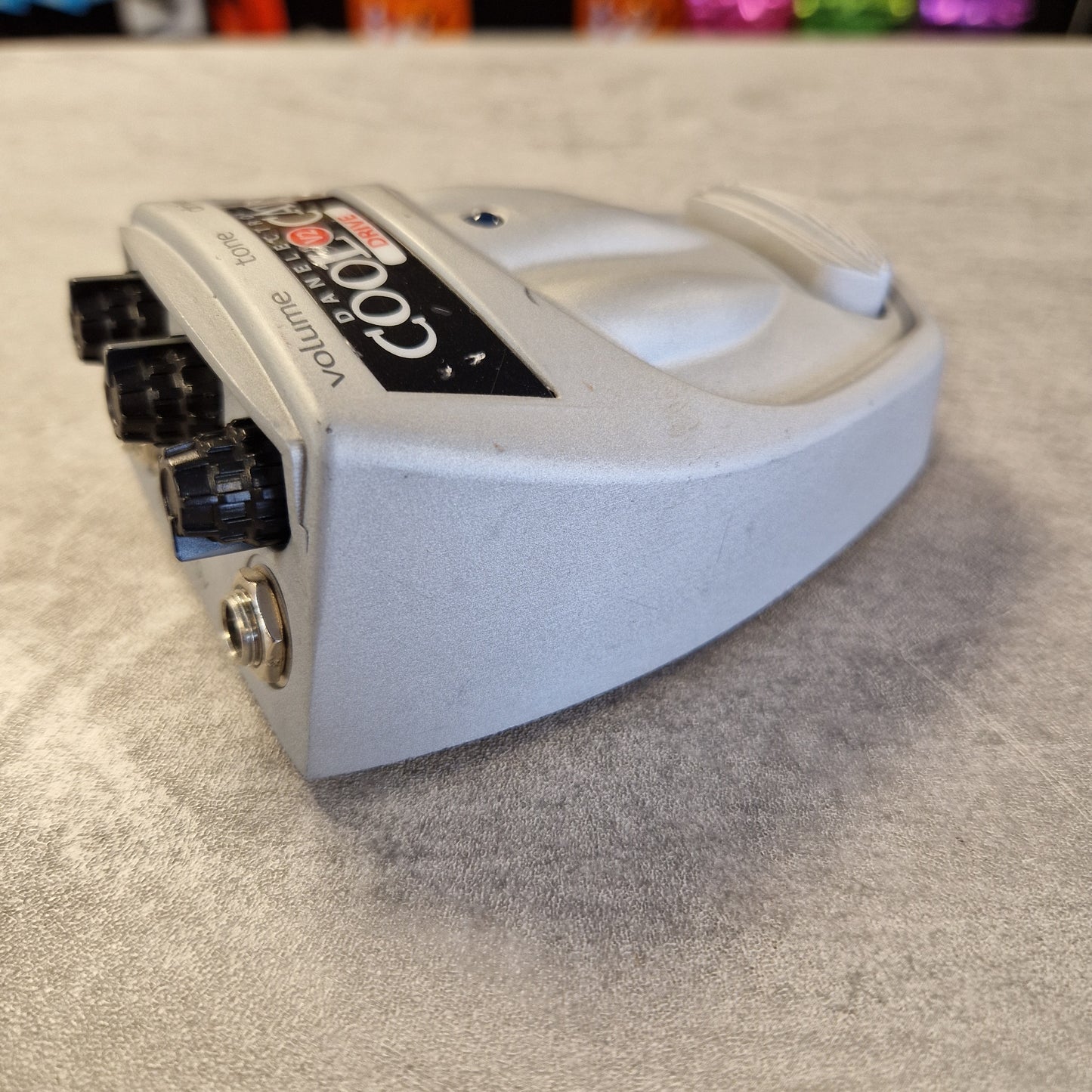 Danelectro Cool Cat V2 Drive White electronic device with multiple ports on a textured surface