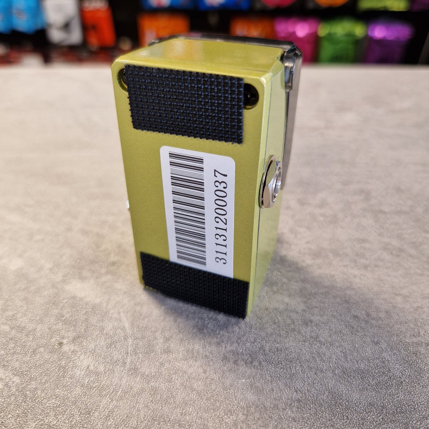 Joyo JF-308 Green device with a barcode label on a textured gray surface