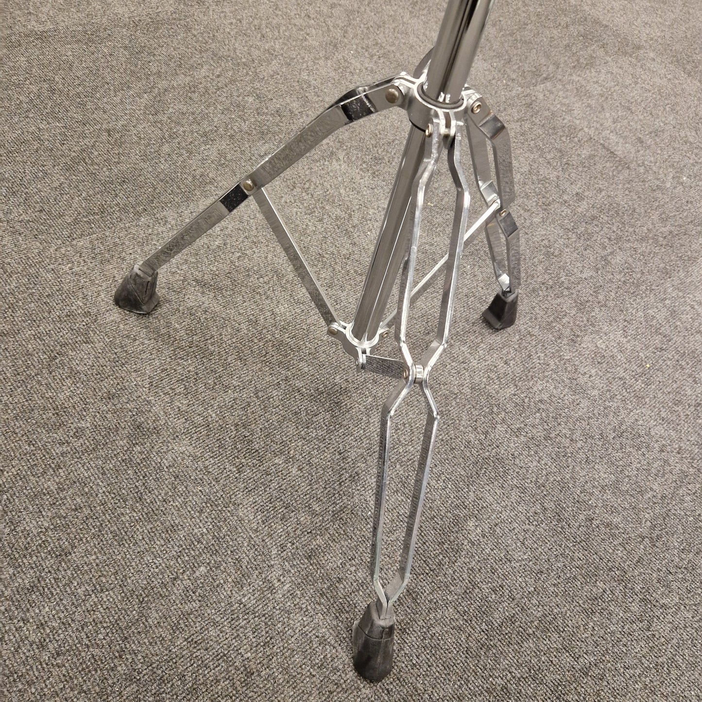 Pre-Owned Yamaha Metal lawn rake on a textured gray surface