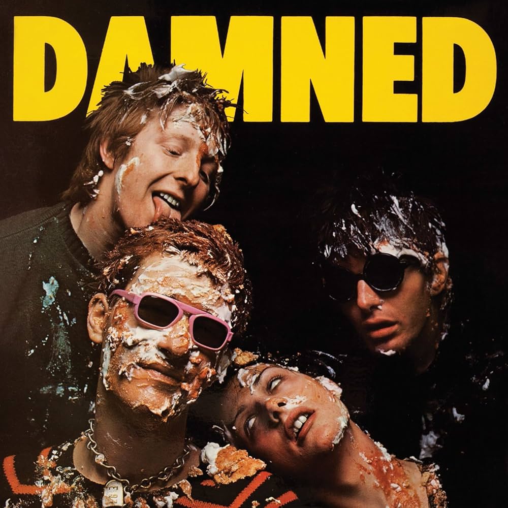 The Damned - Damned Damned Damned Vinyl Album cover with four people with cream on their faces and the word 'Damned' at the top.