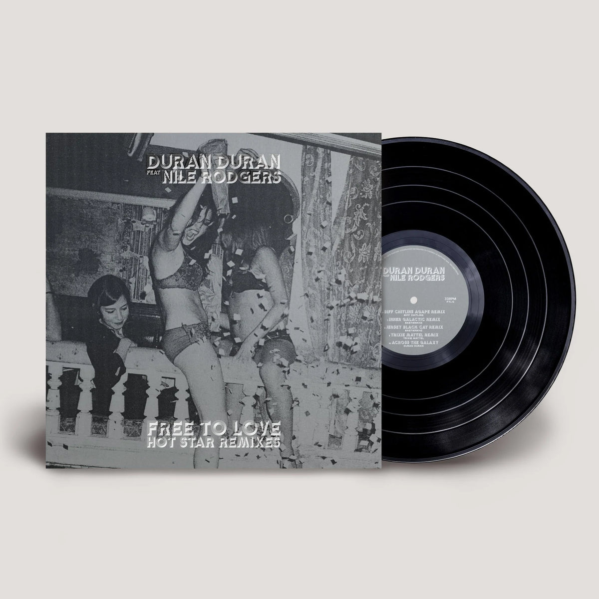 Duran Duran - Free to Love: Hot Star Remixes Vinyl Vinyl record album with the jacket cover and a black LP disc partially visible, shown on a plain light beige background. The cover text reads 'Duran Duran' and 'Free To Love Hot Star Remixer.