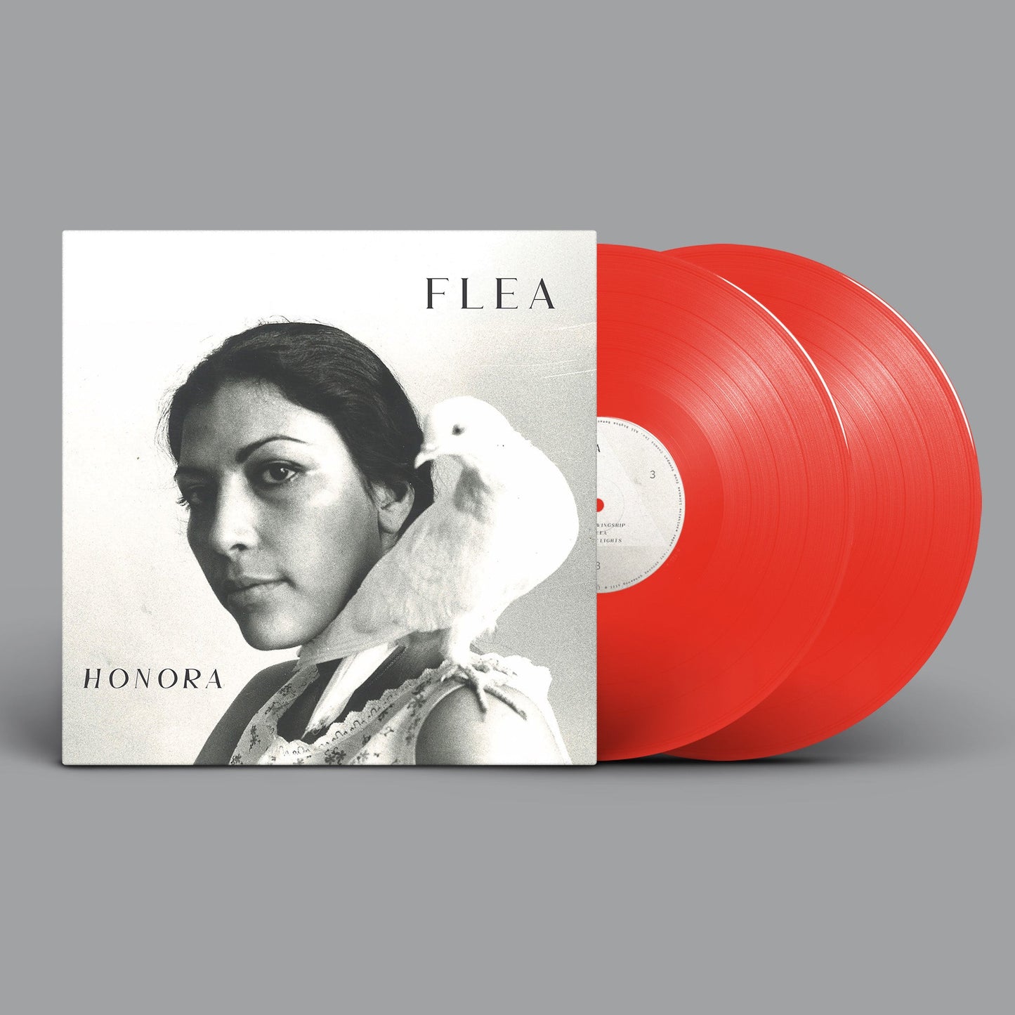 flea honora vinyl cover with red vinyl on grey background