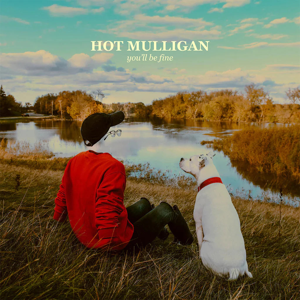 Hot Mulligan Person in red jacket sitting with a white dog by a lake, with 'Hot Mulligan' album cover text.