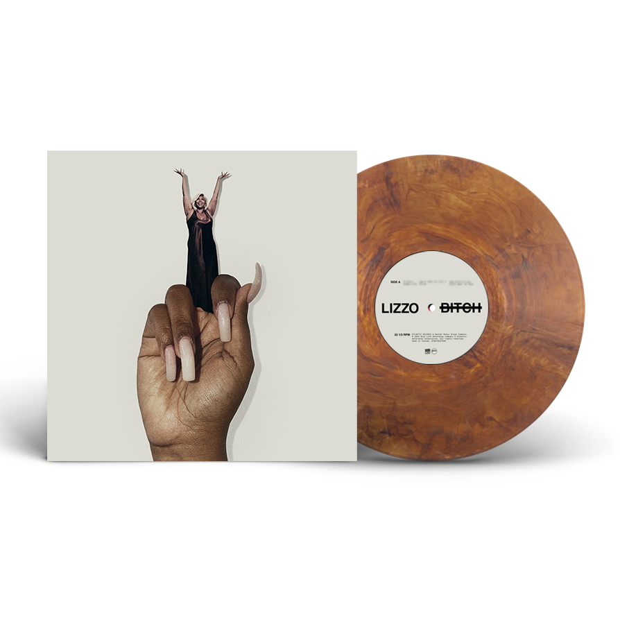Lizzo - Bitch Vinyl record with a hand holding it and a cover featuring a person in the air, on a white background.