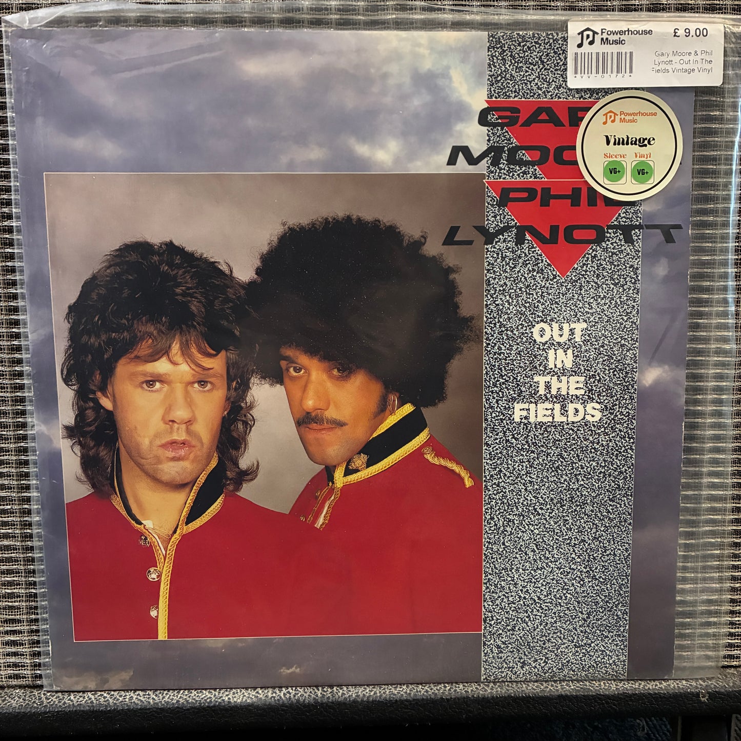 Gary Moore & Phil Lynott Vinyl record cover featuring two individuals in red jackets with a cloudy sky background.