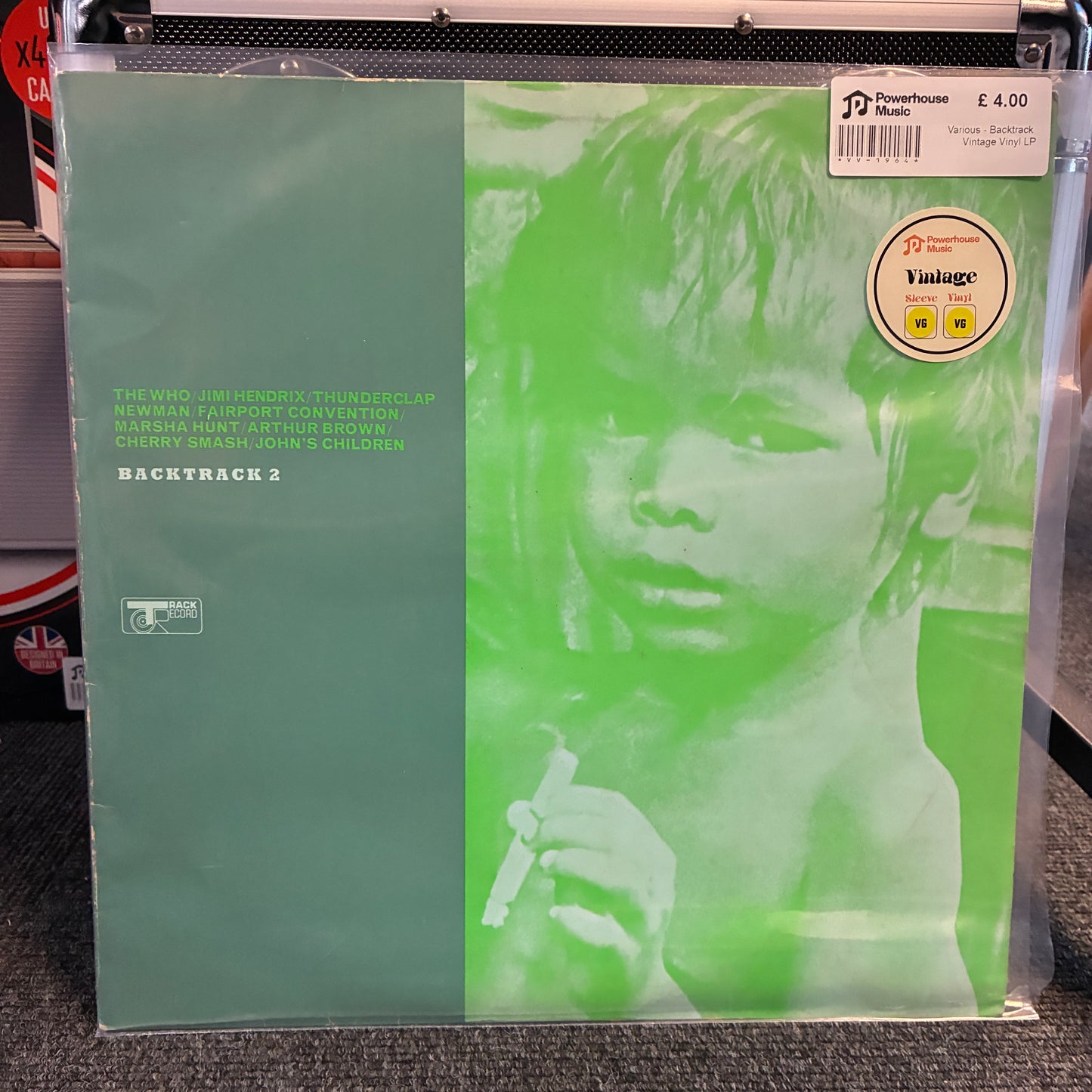 Various - Backtrack 2 Vintage Vinyl LP A vinyl record sleeve for Backtrack 2 by the duo Jim Hendrix and the Thunderlap, featuring a green-toned portrait of a child. The sleeve has a visible Powerhouse Music sticker and a £4.