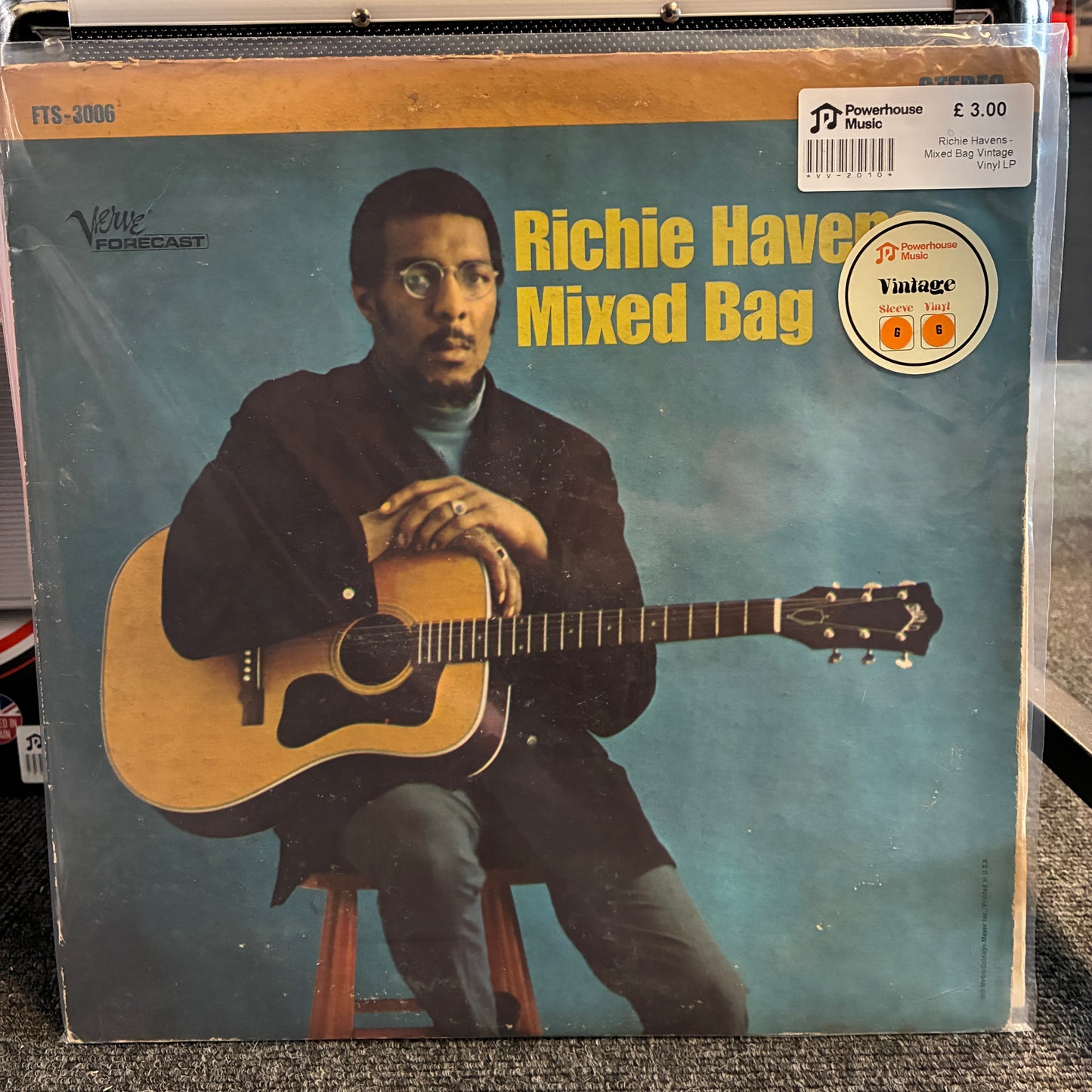 Richie Havens - Mixed Bag Vintage Vinyl LP Richie Havens 'Mixed Bag' vinyl record album cover, sealed in a clear plastic sleeve. The cover features a portrait of Richie Havens sitting and playing an acoustic guitar against a blue-gray background, with yellow title text.