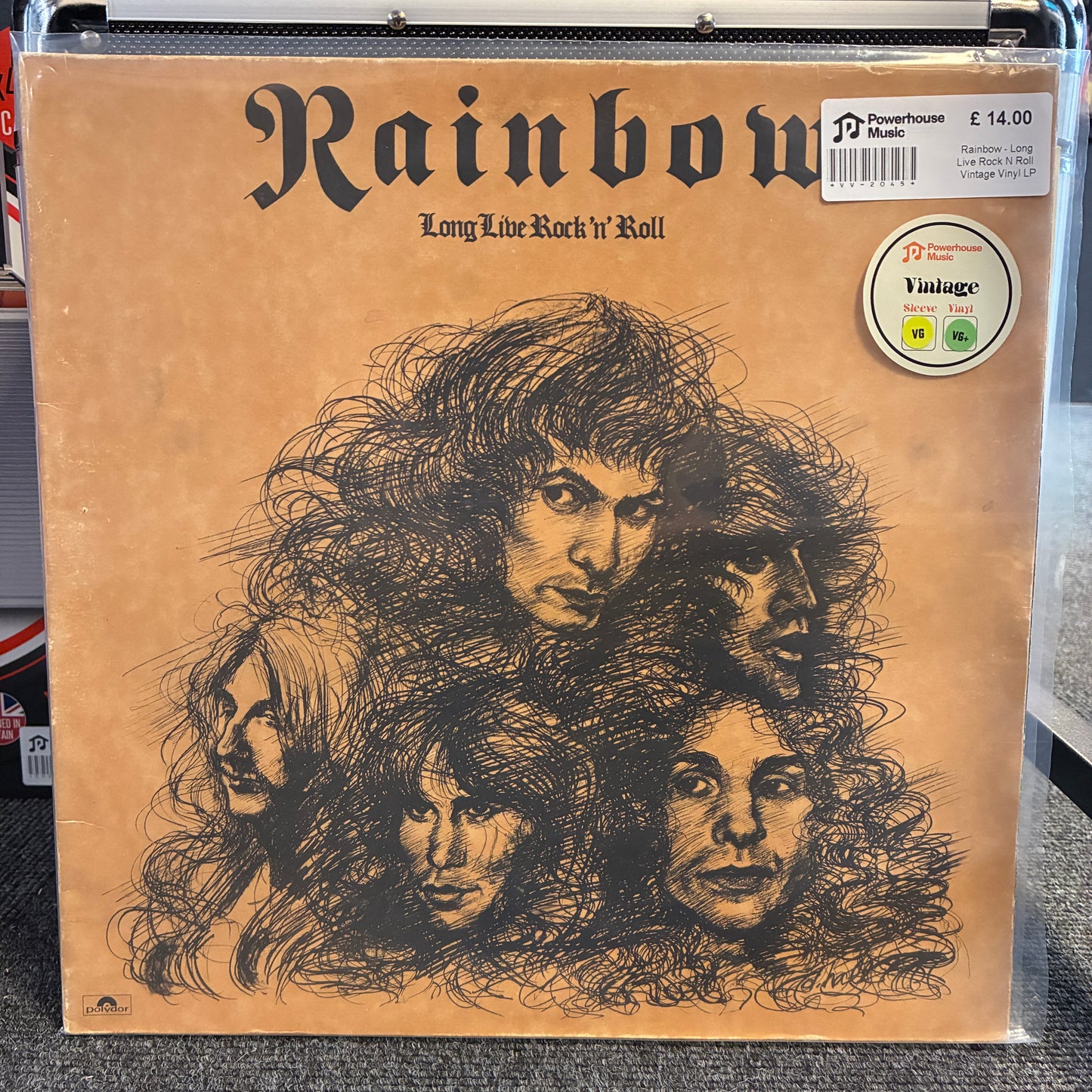 Rainbow - Long Live Rock N Roll Vintage Vinyl LP Vintage vinyl record sleeve for 'Rainbow - Long Live Rock 'n Roll' on a clear plastic shrink wrap, showing a tan cover with black sketch-style portraits and a 'Vintage' sticker.