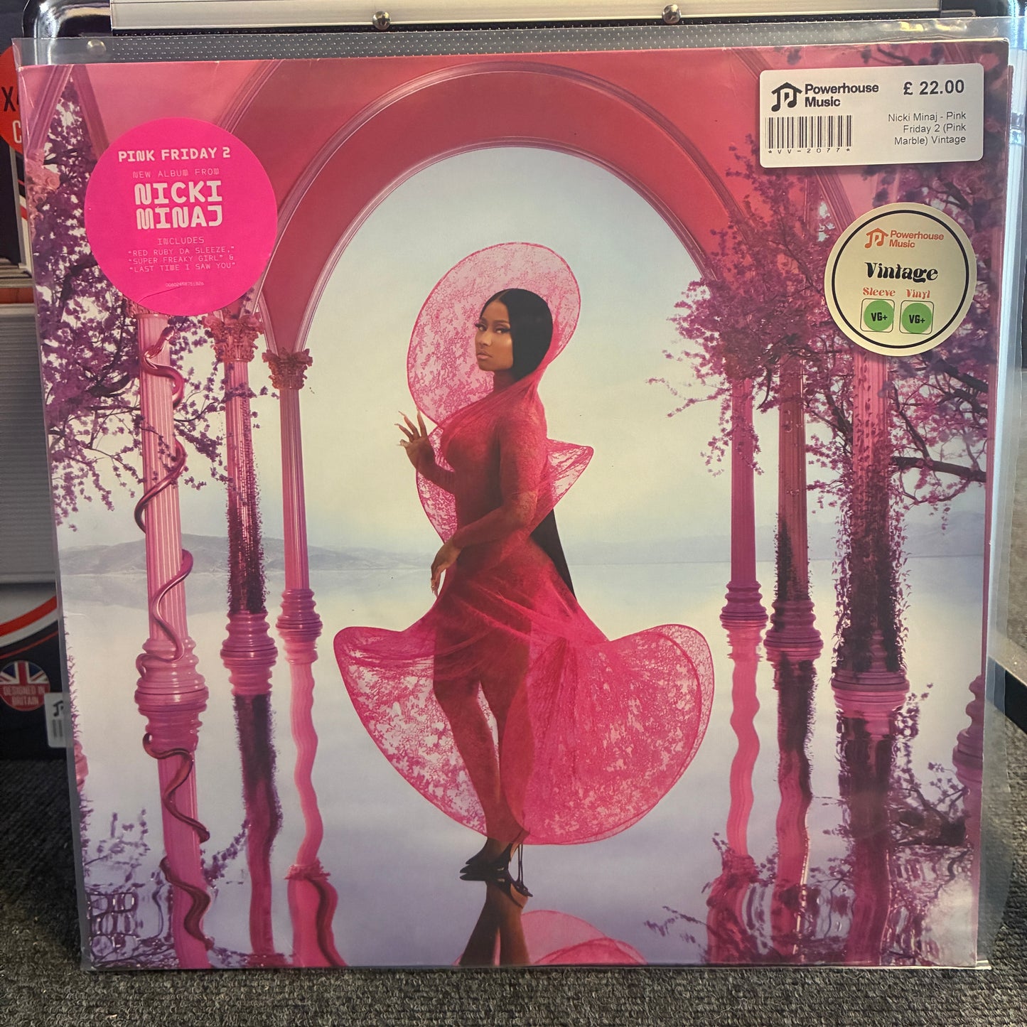 Nicki Minaj - Pink Friday 2 (Pink Marble) Vintage Vinyl LP Pink Friday 2 'Nicki Minaj' vinyl record album in its original shrink wrap, featuring a pink and red illustration of a woman in a flowing dress under an archway. Includes Powerhouse Music and Vintage Records stickers.