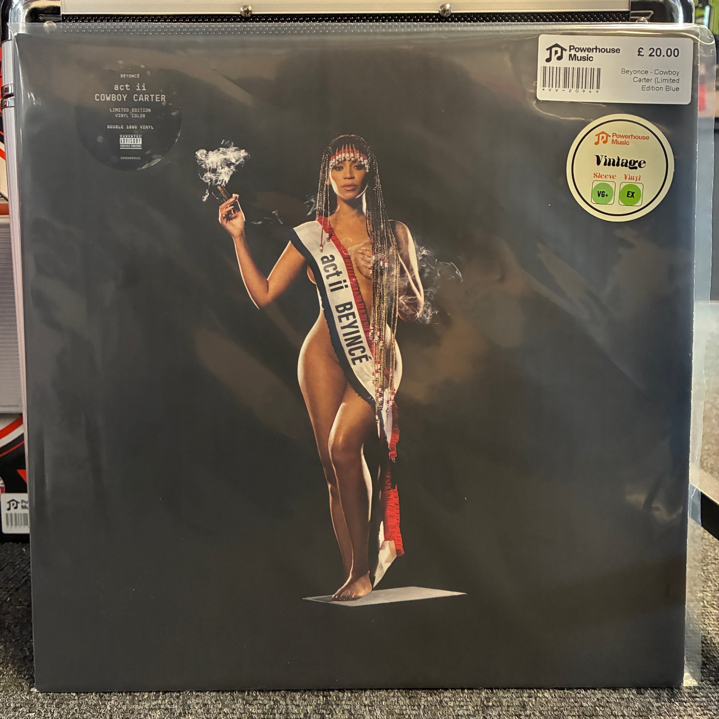 Beyonce - Cowboy Carter (Limited Edition Blue Cowboy Hat Cover) Vintage Vinyl LP A vinyl record sleeve for 'Get Is Cowboy Carter' on the Repeater label, featuring a glossy black cover with a central image of a woman in a white bodysuit and sash reading 'MISS BERMUDA'. A round 'Vintage' sticker is visible in the top right corner.