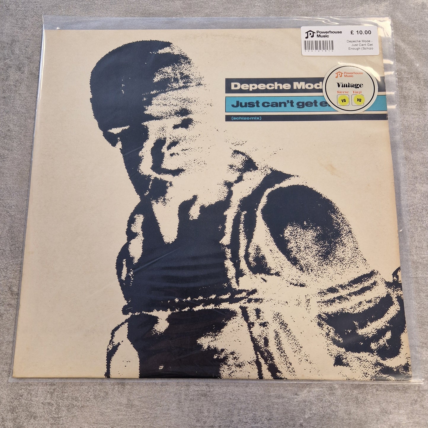 Depeche Mode - Just Cant Get Enough (Schizo Mix) Vintage Vinyl 12" Single A Depeche Mode vinyl record sleeve for the single 'Just can't get it' in the UK, sealed in a clear plastic protective sleeve. The sleeve features a high-contrast black-and-cream graphic portrait of the band members, with the band's name and single details printed on the left side.