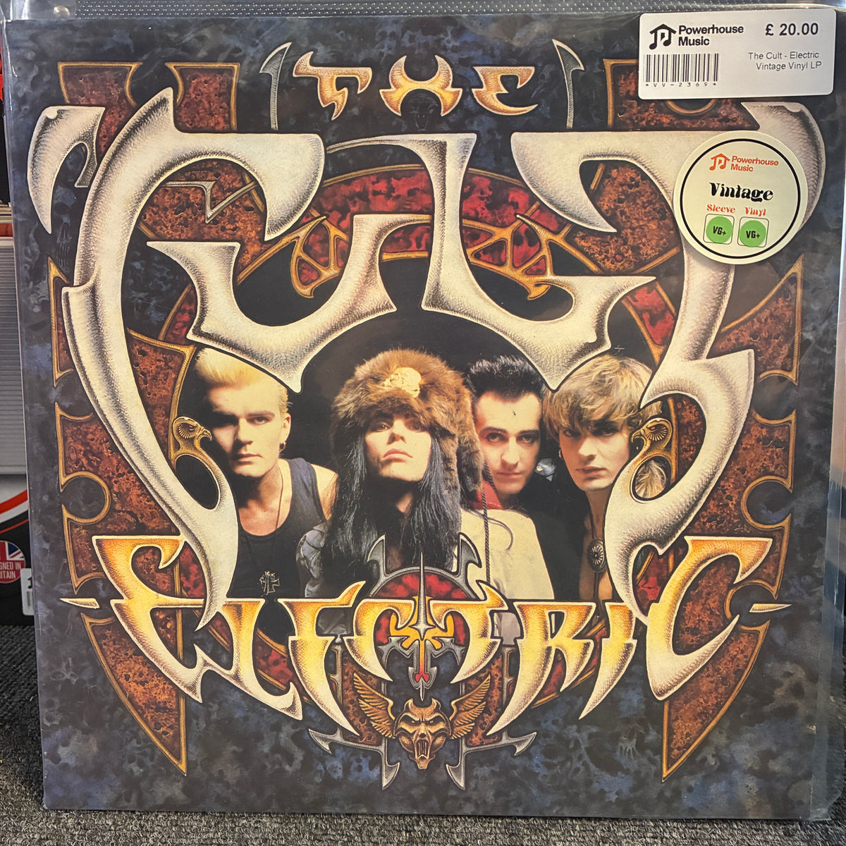 The Cult - Electric Vintage Vinyl LP The Cult of Dvellic vinyl record album cover, featuring the band members in the center with ornate gothic lettering. A Powerhouse Music sticker is visible in the top right corner.