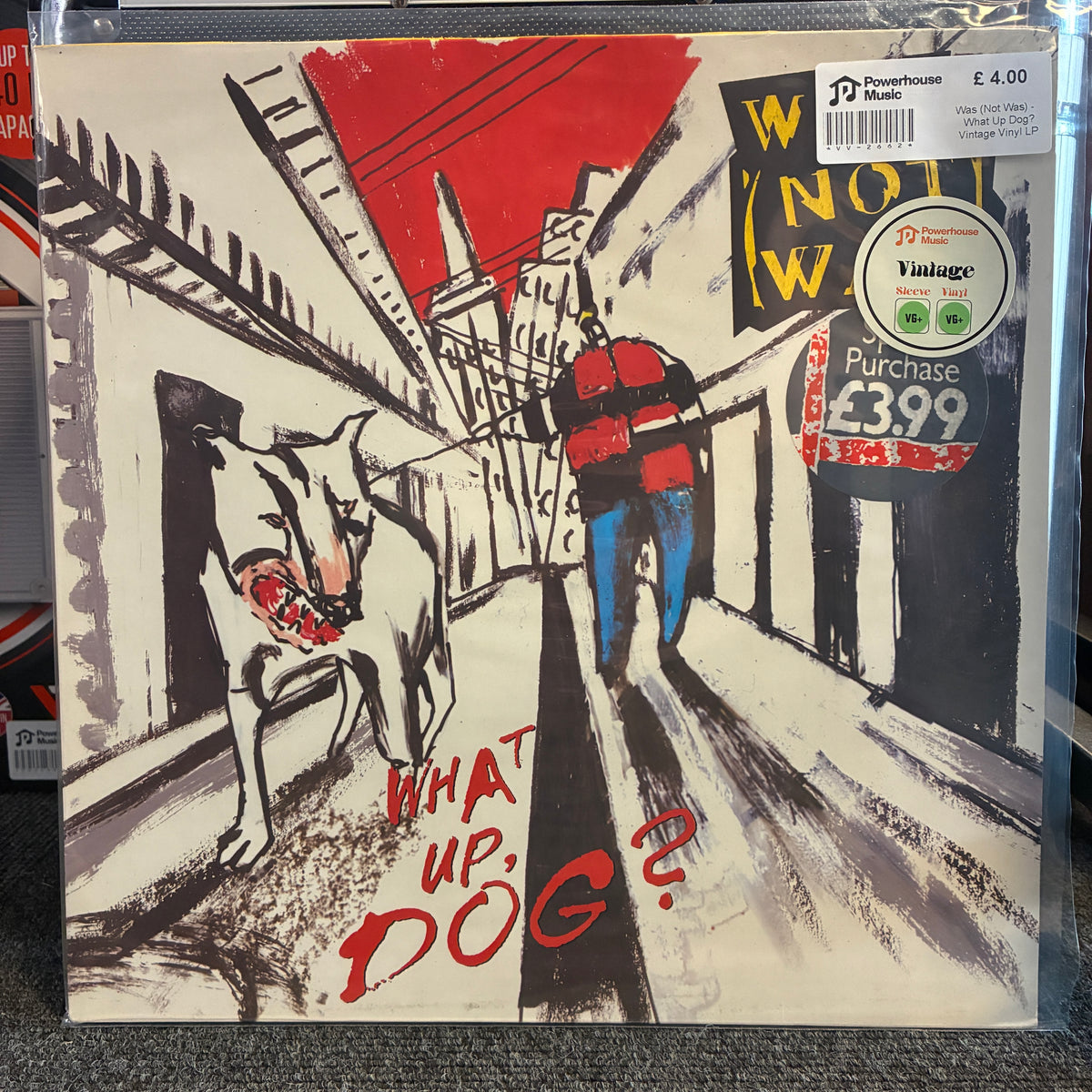 Was (Not Was) - What Up Dog? Vintage Vinyl LP Vinyl record album cover for 'What Up, Dog?' by Wynonna Wheeler, featuring a stylized illustration of a person walking with a dog in a street scene. A barcode sticker and a 'JD Powerhouse Vintage Collection' label are visible on the cover.