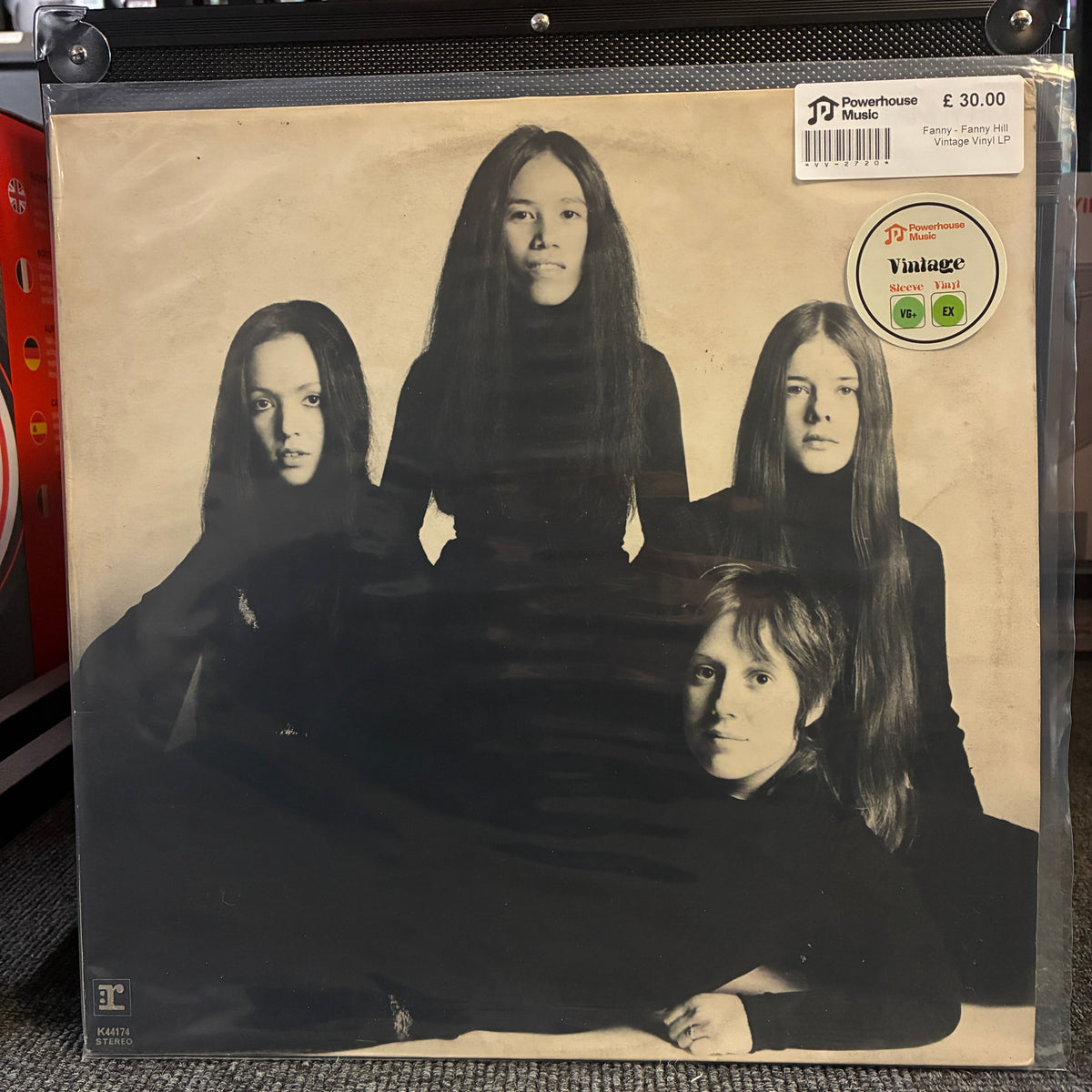 Fanny - Fanny Hill Vintage Vinyl LP A vinyl record sleeve for the band Powerhouse Music's 'Young Try 73' is sealed in a clear plastic protective case. The sleeve features a sepia-toned photograph of the four band members.
