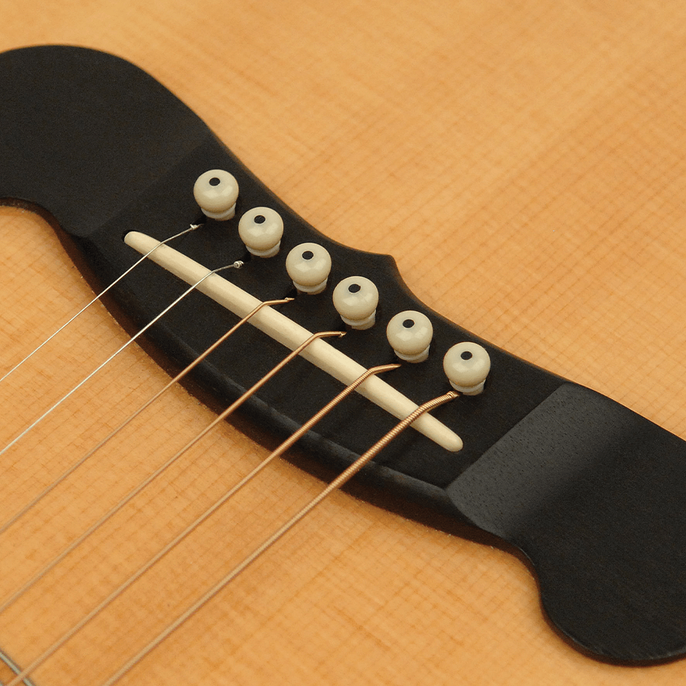 D'Addario Injected Molded Bridge Pins with End PinSet of 7 - Ivory with Ebony Dot