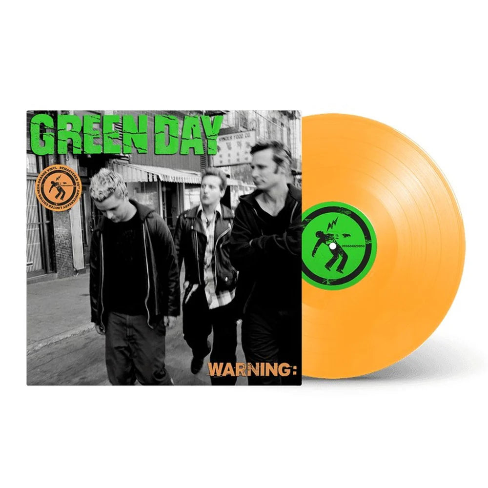Green Day - Warning Vinyl record with 'Green Day' album cover showing band members and an orange disc.