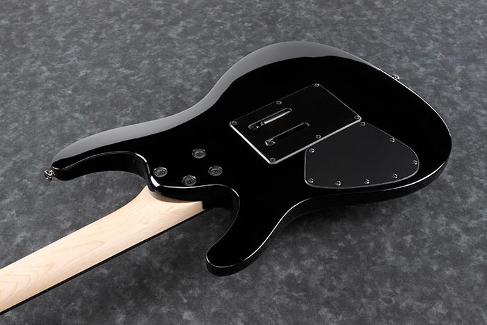 Ibanez JIVAJR-DSE Black electric guitar body on a gray surface