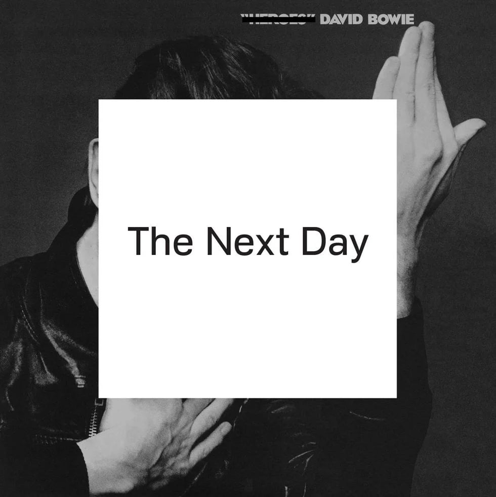 David Bowie - The Next Day Vinyl Album cover for 'The Next Day' by David Bowie with a person holding their hands over their face.