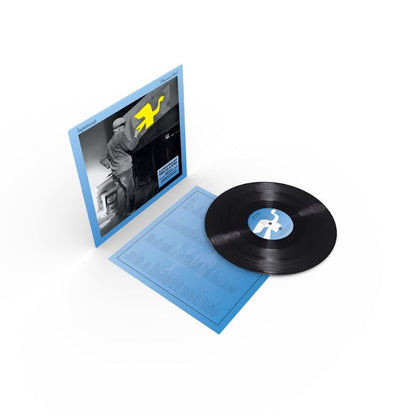 Supertramp - Free as a Bird (Half Speed Master) Vinyl record with blue cover and white label on a white background