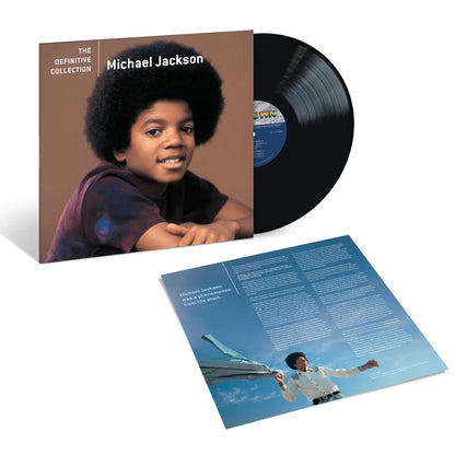 Michael Jackson - The Definitive Collection Vinyl Michael Jackson 'The Definitive Collection' vinyl record package shown on a white background, with the album cover standing upright, a black LP partially visible behind it, and the inner sleeve laid open below.