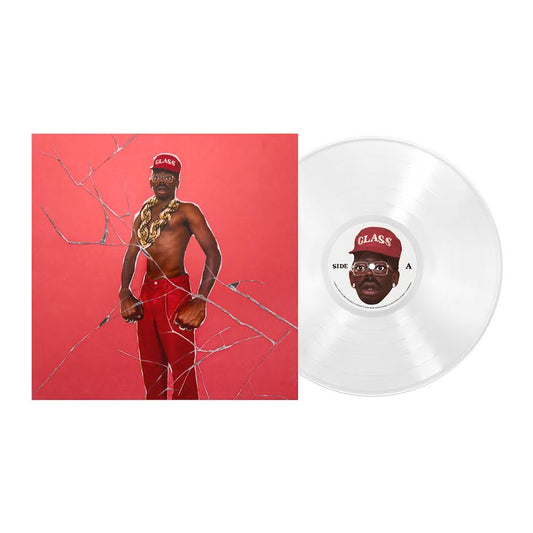Tyler, The Creator - Don't Tap the Glass (Transparent) Vinyl A vinyl record album shown with its square cover art on a plain white background. The cover features a shirtless man wearing red pants and a red cap against a red backdrop, with a cracked-glass effect.