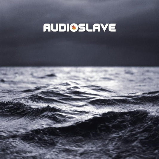 Audioslave - Out Of Exile Album cover with 'Audioslave' logo over a dark ocean scene