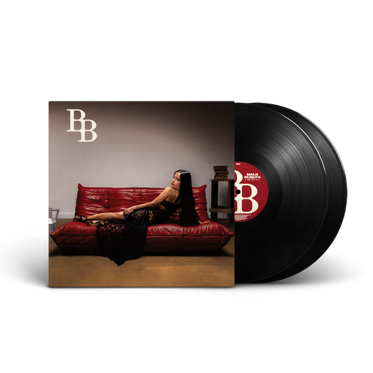Becky G - Baraja Bendita Vinyl Vinyl record with a cover featuring a woman on a red couch, displayed against a white background.