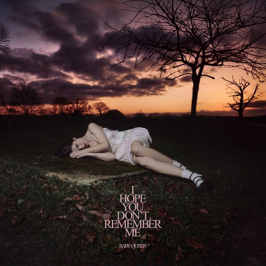 Baby Queen - I Hope You Don't Remember Me Person lying on grass with a tree and sunset in the background, album cover with text 'I Hope You Don't Remember Me' by Baby Queen.