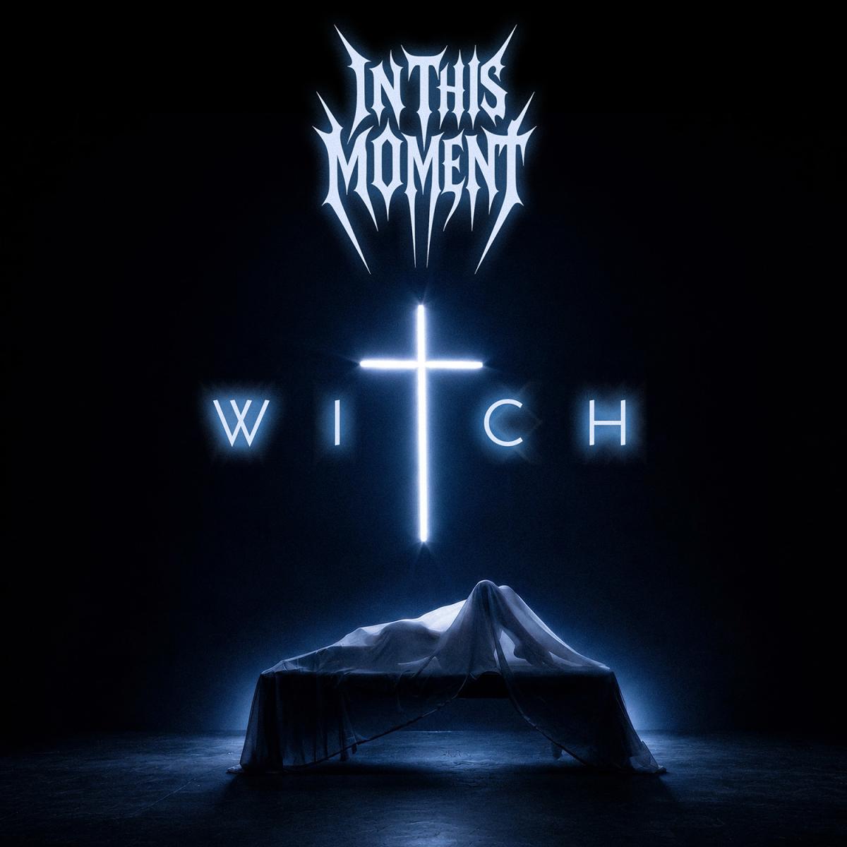 In This Moment - Witch Vinyl Album cover art for 'Witch' by the band 'In This Moment', featuring a dark, atmospheric scene with a draped figure on a table and a glowing cross in the center, with the band name and album title in stylized white text.