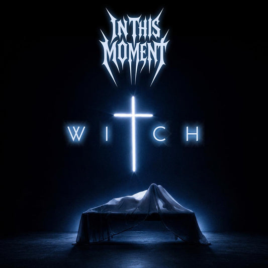 In This Moment - Witch Vinyl Album cover art for 'Witch' by the band 'In This Moment', featuring a dark, atmospheric scene with a draped figure on a table and a glowing cross in the center, with the band name and album title in stylized white text.