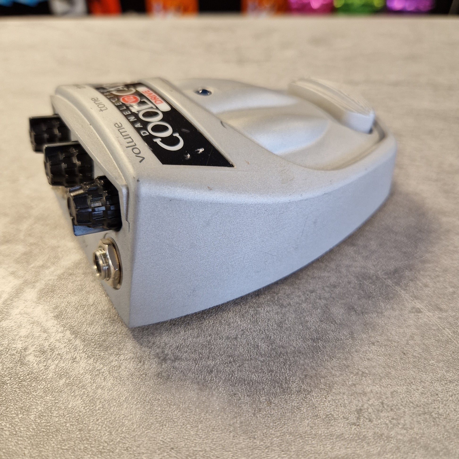 Danelectro Cool Cat V2 Drive White electronic device with multiple ports on a textured surface