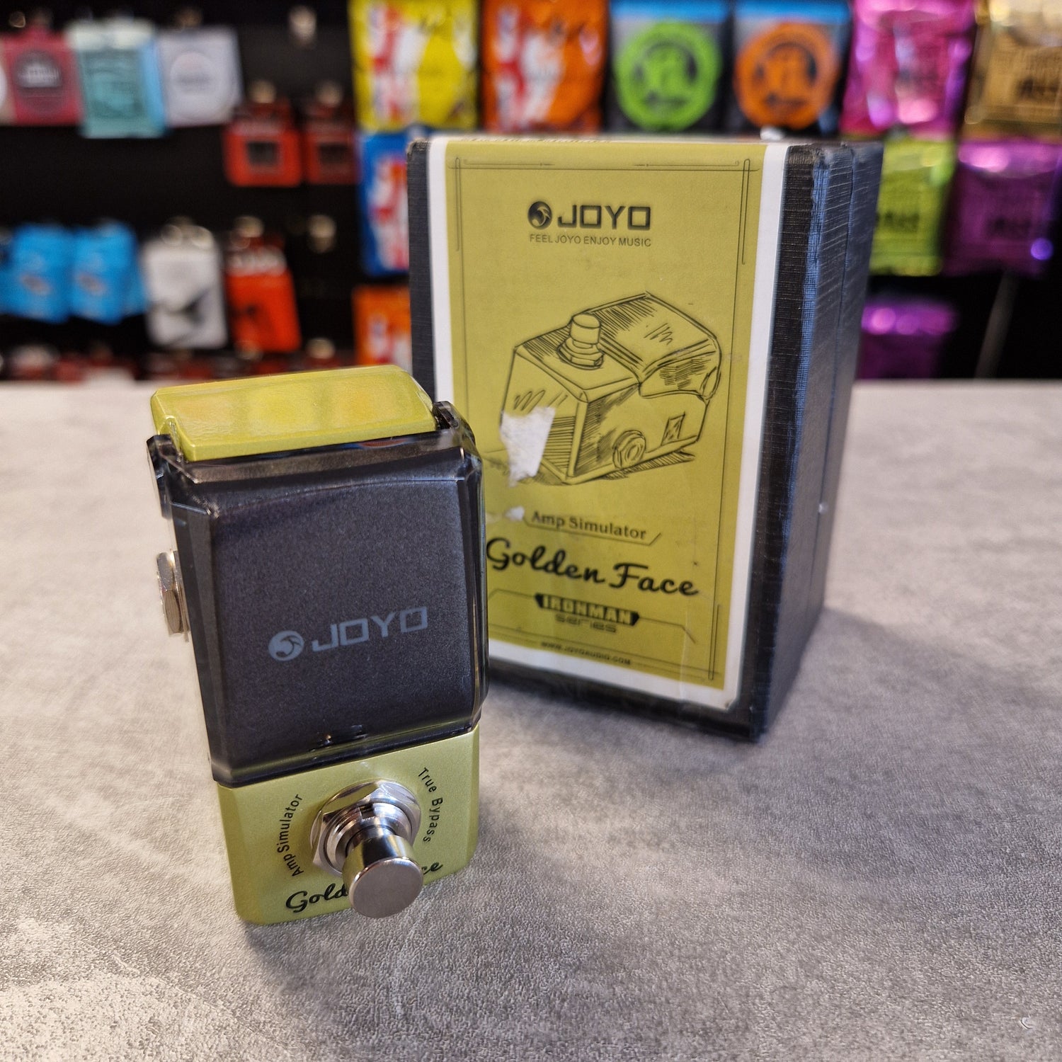 Joyo JF-308 guitar effects pedal with packaging on a textured surface