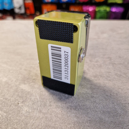 Joyo JF-308 Green device with a barcode label on a textured gray surface