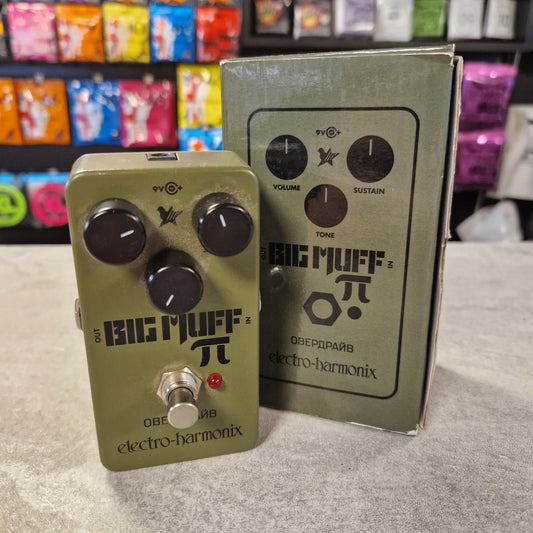 Pre-Owned Electro-Harmonix Two guitar effect pedals with 'Electro-Harmonix' branding on a grey surface.