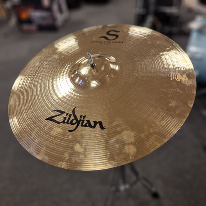 Pre-Owned Zildjian cymbal with a blurred background