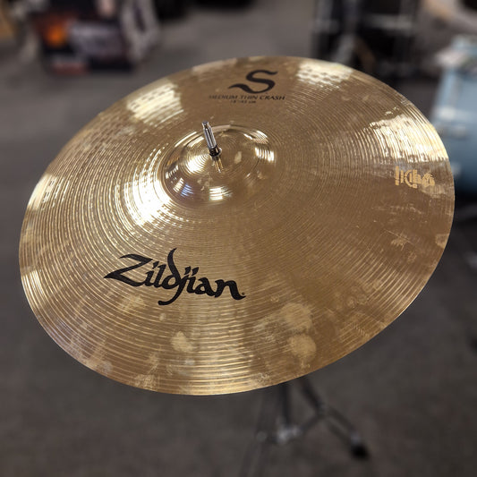 Pre-Owned Zildjian cymbal with a blurred background