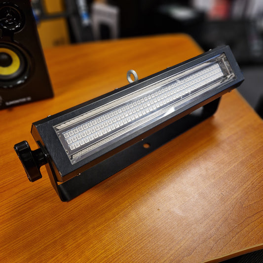 Pre-Owned Cameo LED light bar on a wooden surface