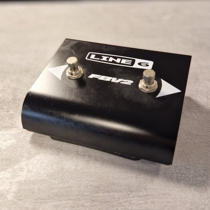 Pre-Owned Line 6 Black guitar effects pedal with 'Line 6' branding on a grey surface