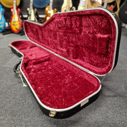 Pre-Owned Hiscox hard case on a blurry shop background