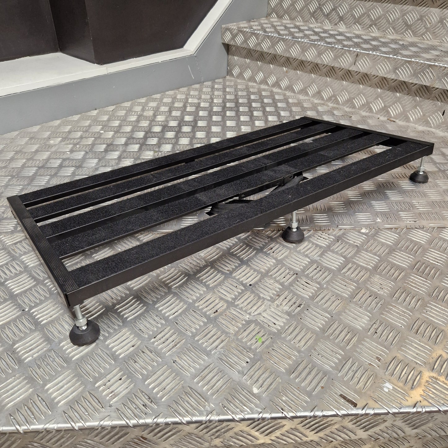 Pre-Owned Palmer pedalboard on metal grate floor