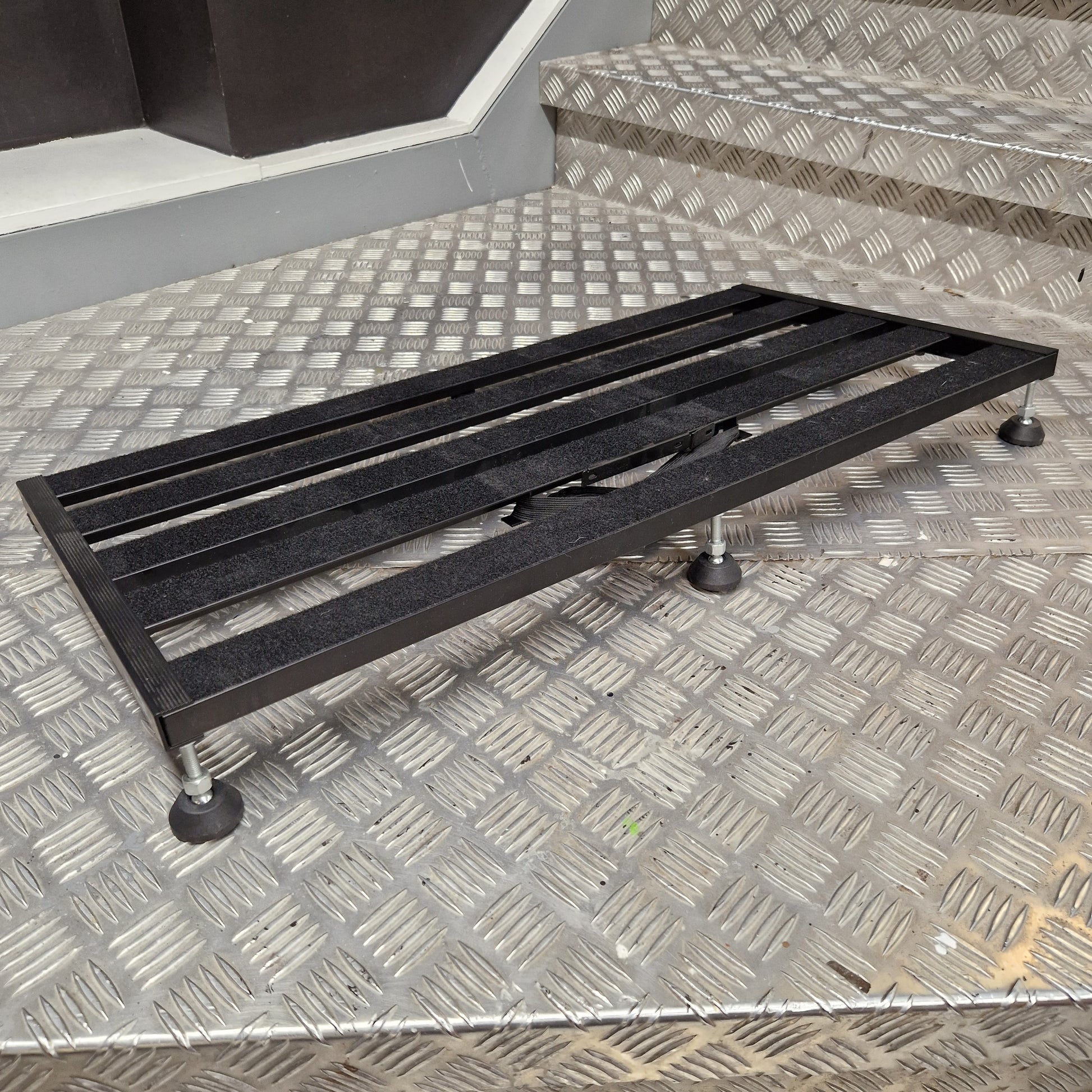 Pre-Owned Palmer pedalboard on metal grate floor