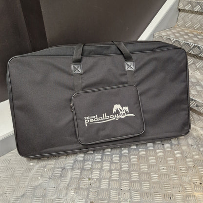 Pre-Owned Palmer Black carrying case with a logo on a textured surface