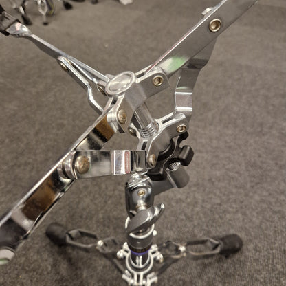 Pre-Owned Yamaha Close-up of a metallic drum pedal on a gray background