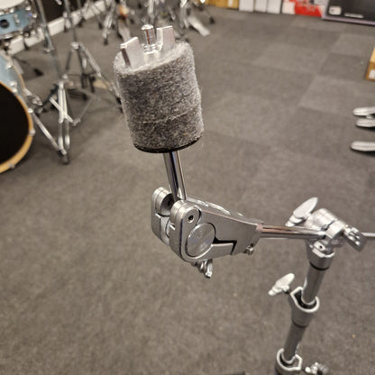 Pre-Owned Yamaha Close-up of a drum cymbal stand on a drum set with a gray background