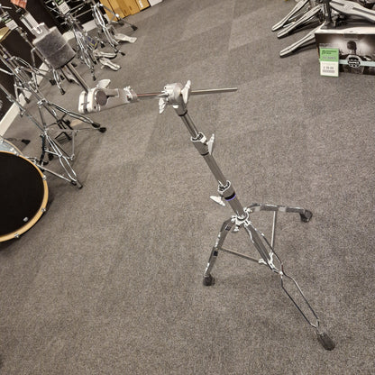 Pre-Owned Yamaha Drum set with cymbal stand on a carpeted floor