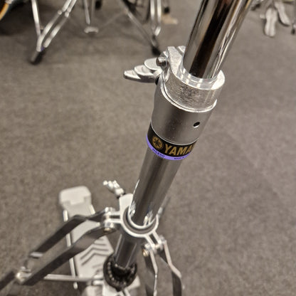 Pre-Owned Yamaha Close-up of a motorcycle suspension fork with 'Yamal' branding on a gray background